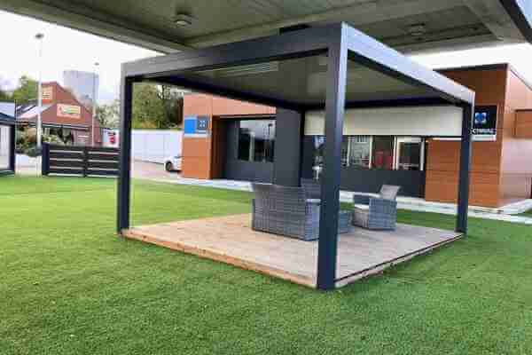 A rest area with artificial grass around the perimeter