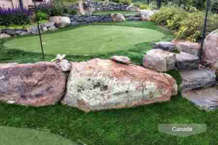Putting green above the stone steps
